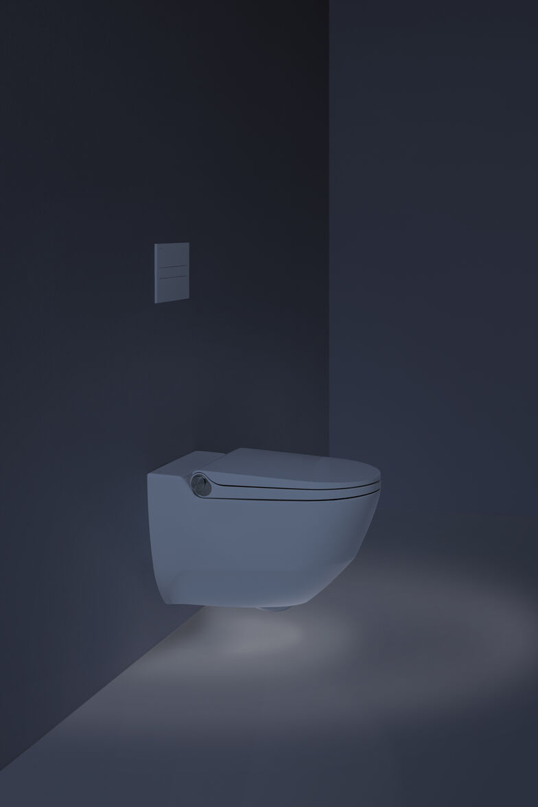 Damit kommen auch Gäste des Hauses zurecht: Das Dusch-WC «Riva» wird über den seitlichen Drehknopf durch Drehen und Drücken intuitiv bedient. Zusätzlich steht eine Fernsteuerung mit Touch-Oberfläche zur Verfügung. Keramik Laufen AG.
